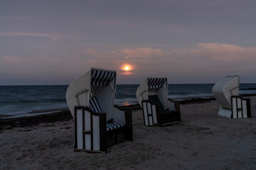 Beach Chairs with moonlight over the beach in Thiessow, Mecklenburg-Western Pomerania, Germany