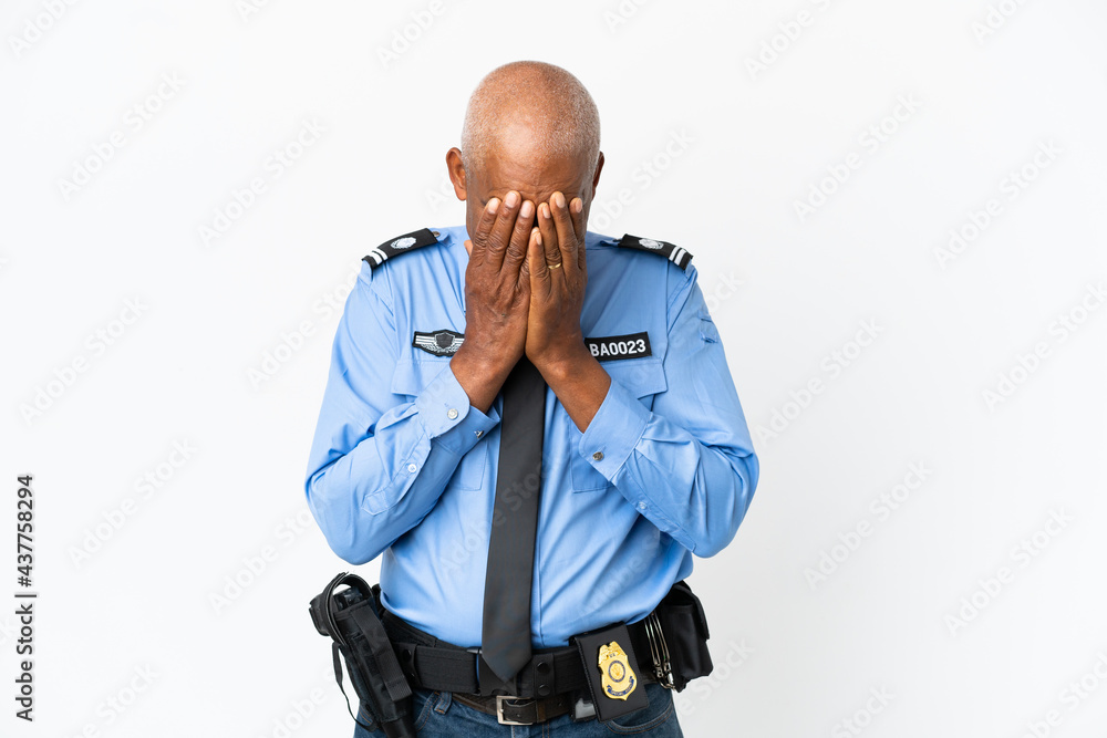 Wall mural Young police man isolated on white background with tired and sick expression