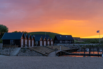 colorful sunset over the small marina and harbor at Ejerslev Lynd in northern Jutland © makasana photo