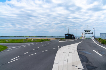 view of the Feggesund ferry arriving in the harbor in Mors © makasana photo