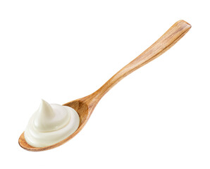 mayonnaise in wooden spoon isolated white background