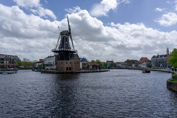 view of the Dee Adrian Windmill and Binnen Spaarne River in Haarlem