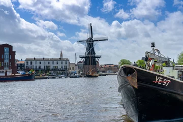Deurstickers view of the Dee Adrian Windmill and Binnen Spaarne River in Haarlem © makasana photo