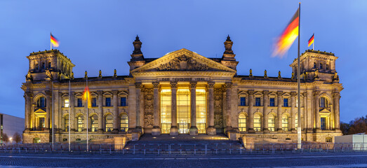 Fototapeta premium Berlin Reichstag Bundestag Parliament Government building panoramic view twilight blue hour in Germany