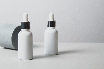 mockup of beauty fashion cosmetic makeup bottle lotion  serum dropper product with skincare healthcare concept on background