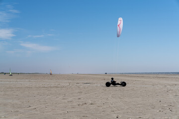 kite buggy enjoying a windy day on the Wadden Sea island beaches of western Denmark