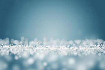 Abstract blue background with bokeh.