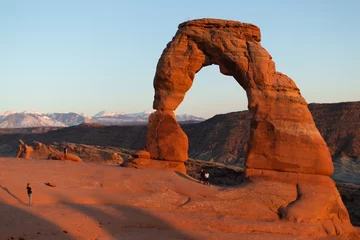 Foto op Canvas Delicate Arch of Utah at Sunset with Moutain Waas in the background © Jay