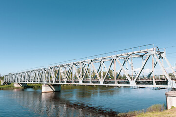 Iron structure railway bridge over the river