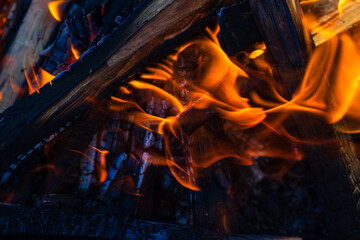 Amazing view of burning wood chips forming coal - Barbecue preparation, fire before cooking