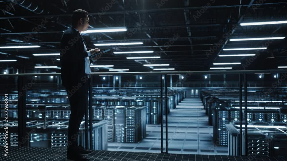 Aufkleber Portrait of IT Specialist Using Tablet Computer in Data Center. Big Server Farm Cloud Computing Facility with Male System Administrator Working. Cyber Security, Network Protection Services. Wide Arc