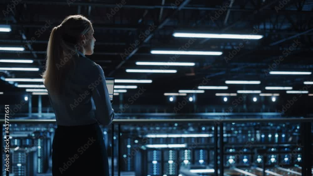 Poster Data Center Professional Female e-Business Fintech Startup Manager Uses Laptop Computer. Cloud Computing Server Farm with Information Technology Professional Administrator Monitoring Statistics
