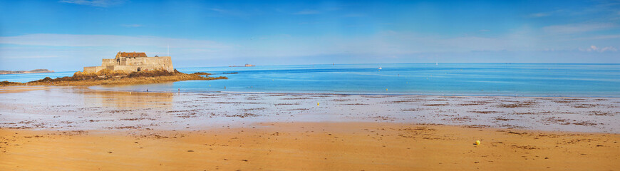view of Sillon beach and and Fort National in Saint-Malo, Brittany, France