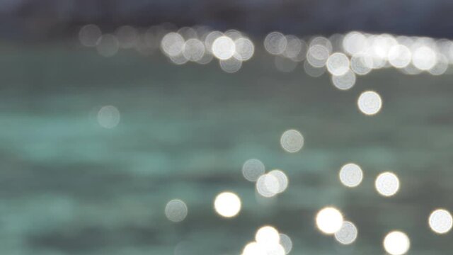 Blurred sunlight reflection on the sea surface.