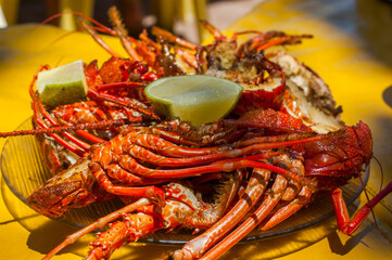 lobsters with lemon on a plate in restaurant