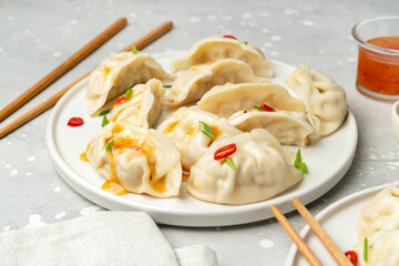 Take out food. Gyoza dumplings with soy sauce. 