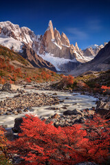 Majestic Cerro Torres in autumn, coloured trees, Patagonia, Argentina. 