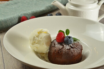 Lava cake with ice cream berries and mint chocolate pudding