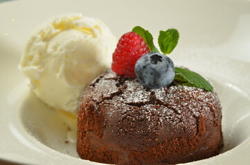 Lava cake with ice cream berries and mint chocolate pudding
