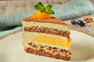 Cake dessert with on the wooden table, rustic style. Selective focus on peace of cake.