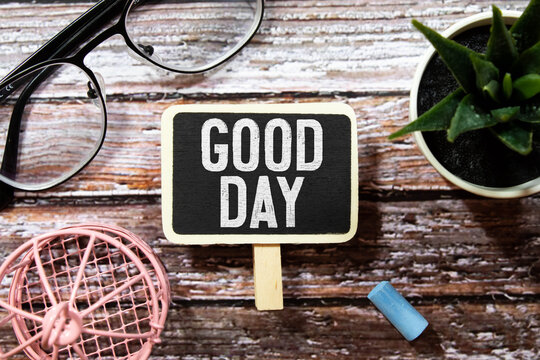 Have a nice day, text GOOD DAY on black plate.