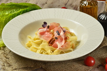 italian pasta with ingredients on wooden rustic background