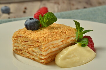 Cake dessert with on the wooden table, rustic style. Selective focus on peace of cake.