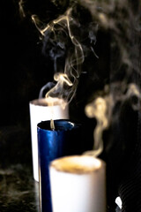 CANDLES WITH FLAMES OR SMOKE