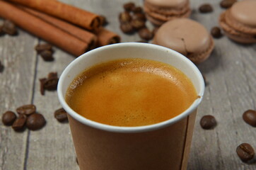 Top view of Latte hot coffee (or cappuccino) roasted coffee beans and ingredients on wooden table