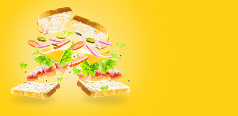 In the photo we see a sandwich in a state of levitation. Sandwich pictured in the left corner. Pastel light colors. Pale yellow background. High angle view. There is a place for your insert.