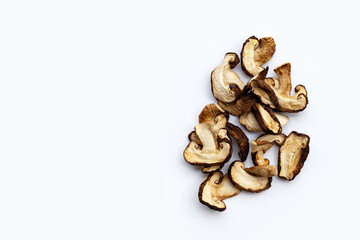 Dried shiitake mushrooms on white background. Topview