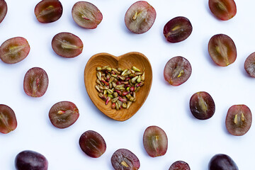 Fresh grape with seeds on white background