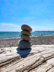 Cairn of Beach Pebbles ion Driftwood