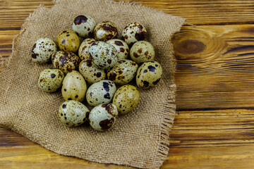 Quail eggs on a wooden table