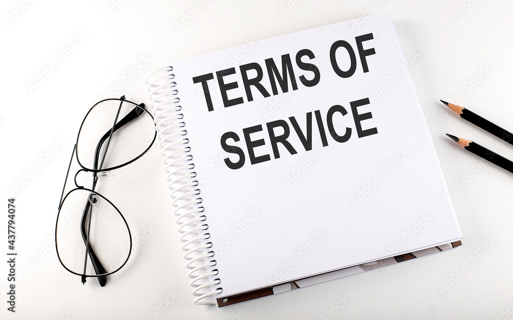 Fototapete Notepad with text TERMS OF SERVICE . White background. Business