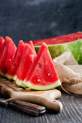 Slices of watermelons on cutting board