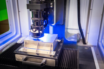 Automatic plasma cutter close-up. Plasma cutting chamber for production. CNC equipment plasma...