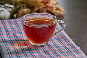 closeup cup of ice tea on knapkin