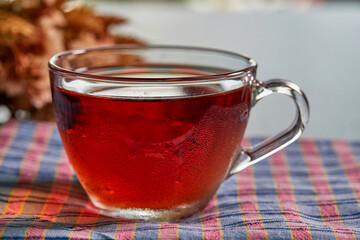 closeup cup of ice tea on knapkin