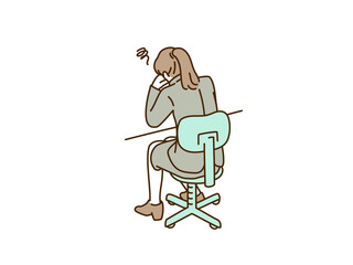 机で落ち込むビジネスウーマン