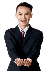 young attractive asian business man wearing black suit with white shirt and necktie puts his hands out in white background isolated