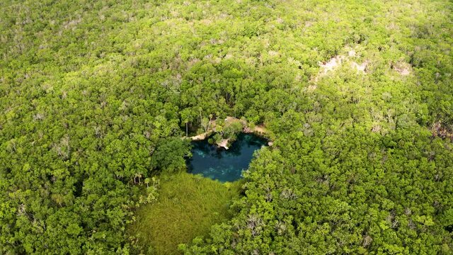 Aerial view of the beautiful heart shaped cenote 