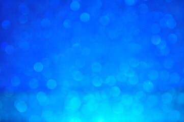 Abstract blue bokeh glitter on nature background