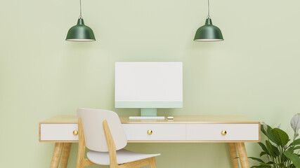 Computer with mock-up screen on the desk with chair, lamp and plant pot in green wall room, 3D rendering