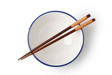 Top view of White bowl is empty, and chopsticks are placed on top of the bowl isolated on a white background.