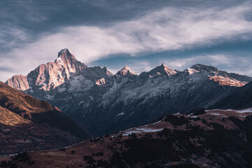 Fototapeta premium sunrise over the snow mountains
