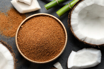 Flat lay composition with natural coconut sugar on grey table