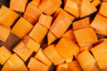 Fresh carrots diced. Top view, macro photography.