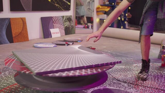 A painter is creating a picture 