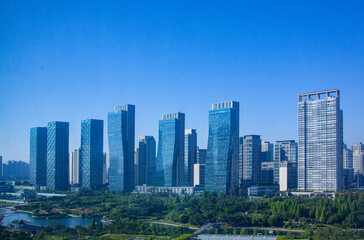 Fototapeta premium Tall residential buildings and hotels next to large parks.